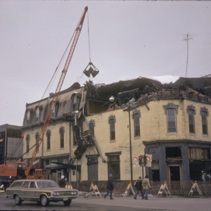 Demolition of the Odd Fellows Building, Corner of  East College & South Dubuque Streets, 1975