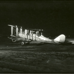 Air Mail plane on field, 1925